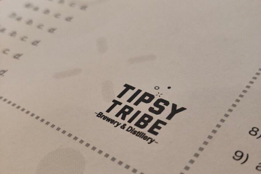 A menu with the text 'TIPSY TRIBE Brewery & Distillery'. 4