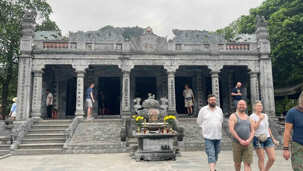 A temple with ornate carvings and a central altar. 5