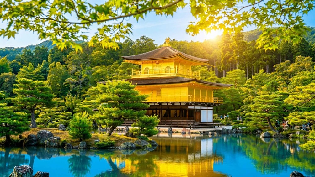 A traditional Japanese pagoda surrounded by a serene pond and lush greenery. 1