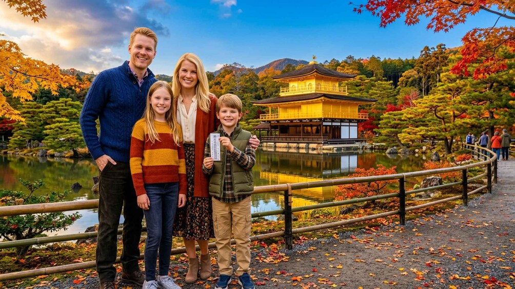A family in front of a traditional Japanese building with a pond and autumn foliage. 4