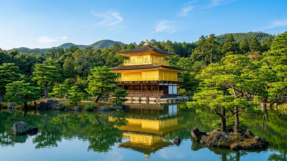 A traditional Japanese pagoda surrounded by a tranquil pond and lush greenery. 2