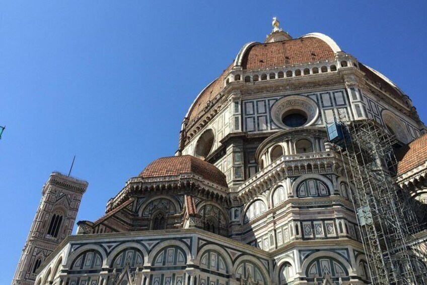 A historic cathedral with intricate architectural details and a dome. 5