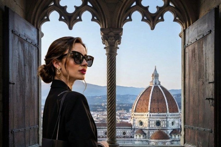 A person standing in a Gothic archway overlooking the Florence Cathedral's dome. 1