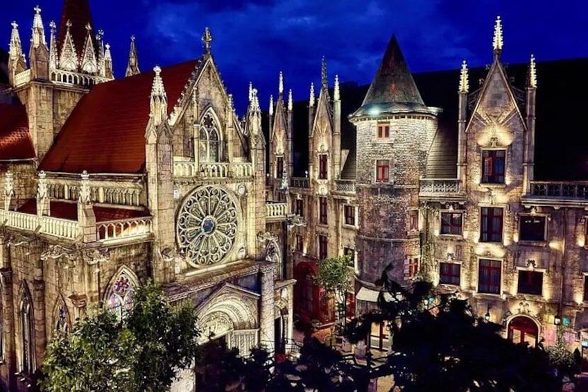 A Gothic-style cathedral with a large clock and spires. 5