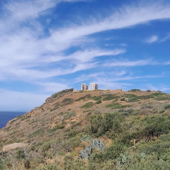 A hill with ruins and a clear sky. 2