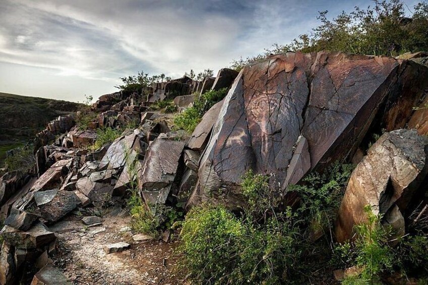 Group tour Tanbaly Ancient petroglyphs UNESCO World Heritage 2