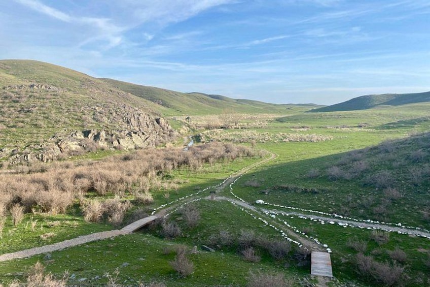Group tour Tanbaly Ancient petroglyphs UNESCO World Heritage 3