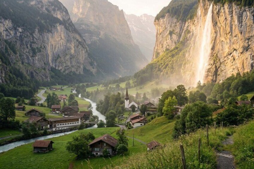 Ein Dorf eingebettet in ein Tal, mit einem Fluss, umgeben von steilen Klippen und einem Wasserfall. 4