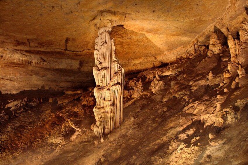 A cave with stalactites and stalagmites. 5
