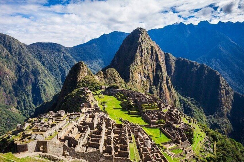 Machu Picchu, an ancient Incan city, with terraced fields and stone structures. 1