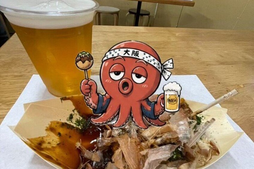 A meal with a drink and a cartoon octopus character. 3