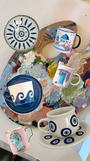 Ceramic tableware with blue and white patterns, including a plate, a mug, and a cup with saucer. 3