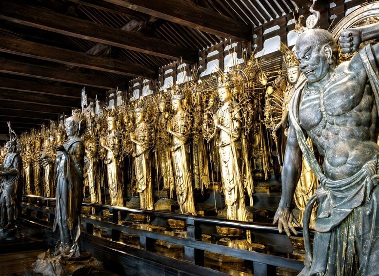 A collection of golden statues in a temple. 3