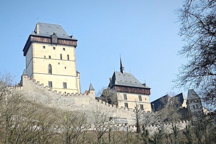 A castle with multiple towers and a fortified wall. 3