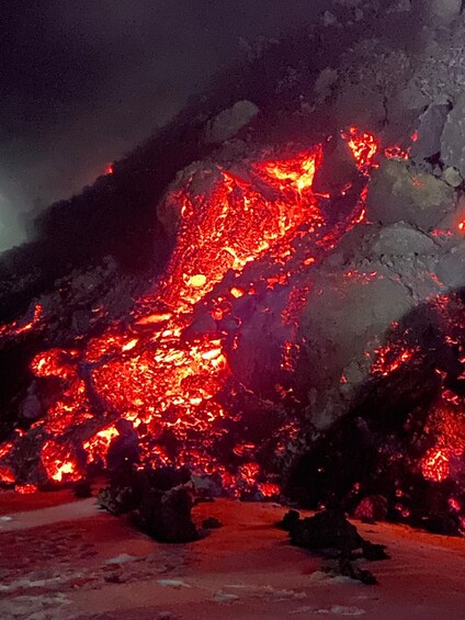 A volcanic landscape with flowing lava. 5