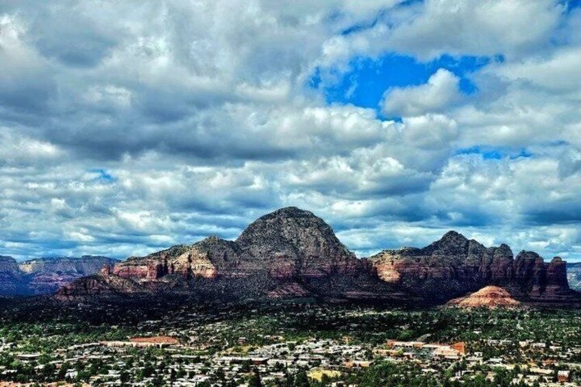 A mountain range with a town in the foreground. 1
