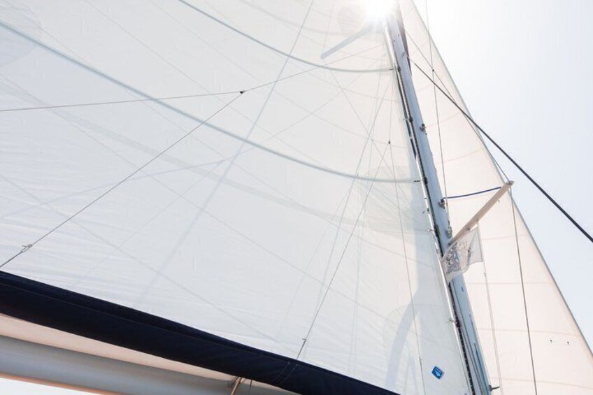 A sailboat's mast and sails. 3