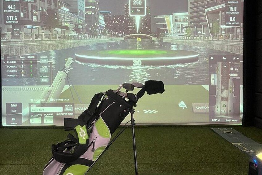 A golf cart with a screen displaying a golf game interface. 4