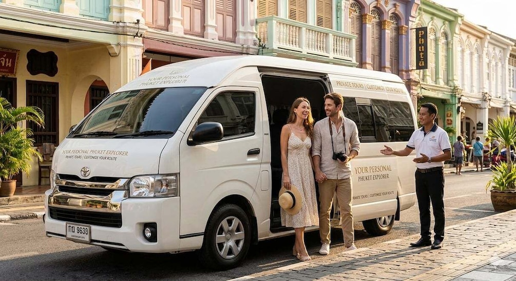 A white van with 'Your Personal Phuket Explorer' written on it, parked on a street with buildings in the background. 5