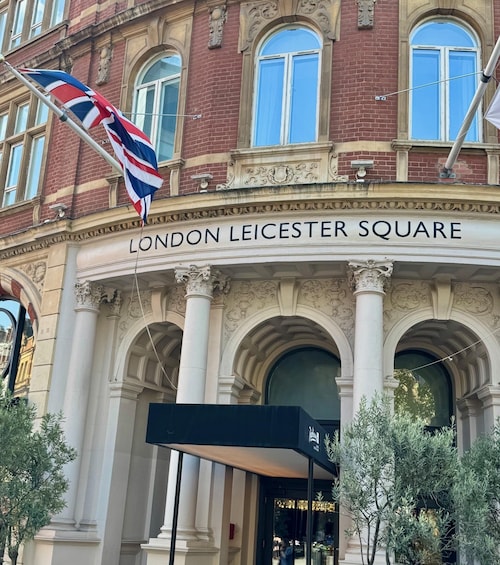 The London Leicester Square building with a British flag. 1