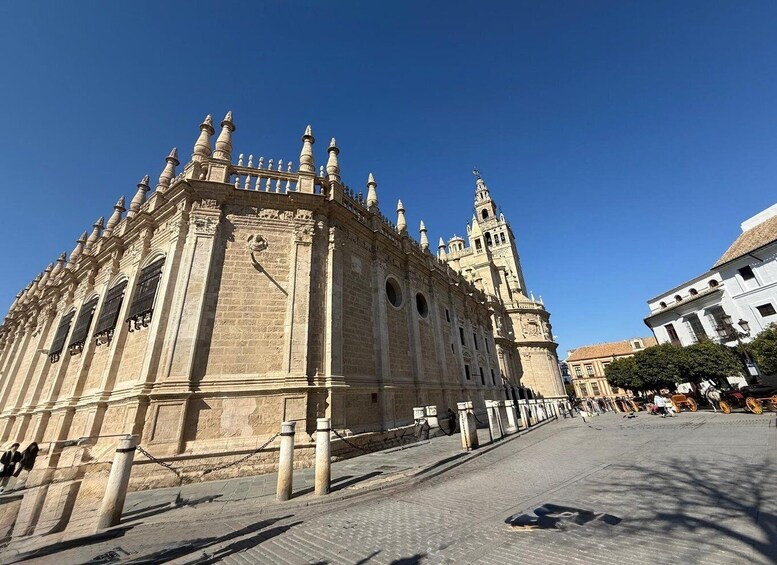 A historic cathedral with ornate architecture and a clock tower. 5