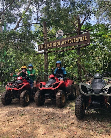Three people on ATVs at Bukit Sari Rock ATV Adventure. 2