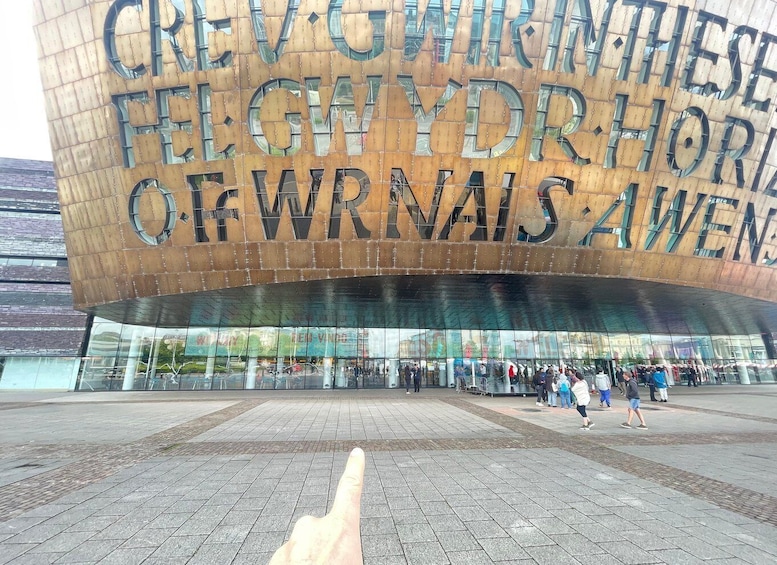 A modern building with large letters spelling out 'CREW WITHIN THESE FEGWYDRHORS OF WRNAIS AVENUE.' 5