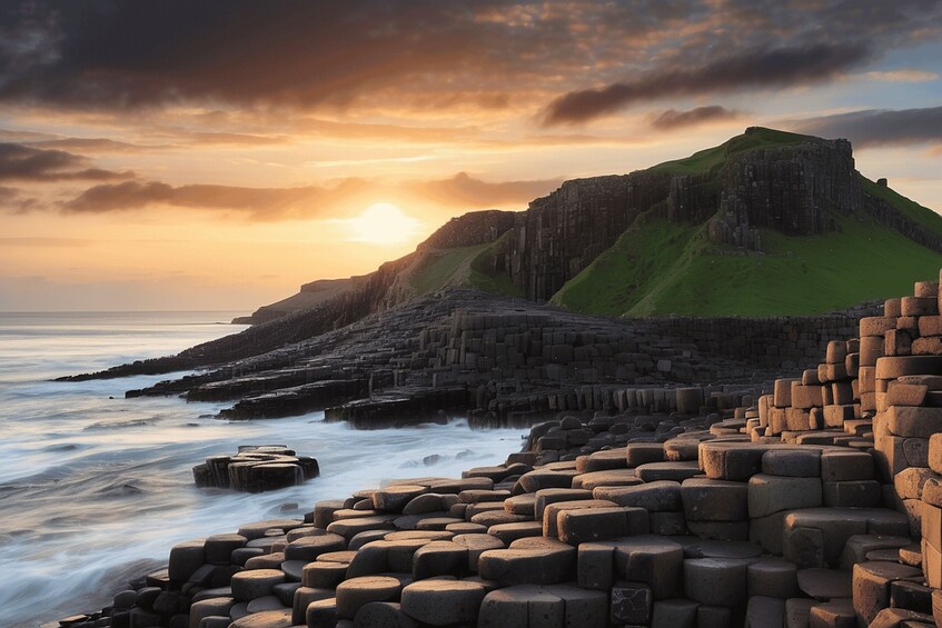A coastal landscape with a sea wall and a hill with ruins. 1