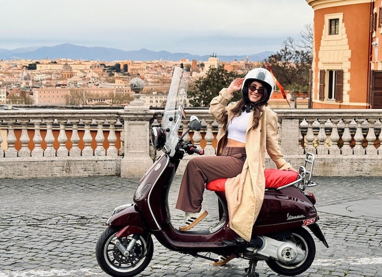 A person sitting on a scooter with a cityscape in the background. 4