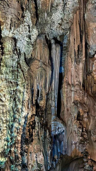A cave with stalactites and stalagmites. 3