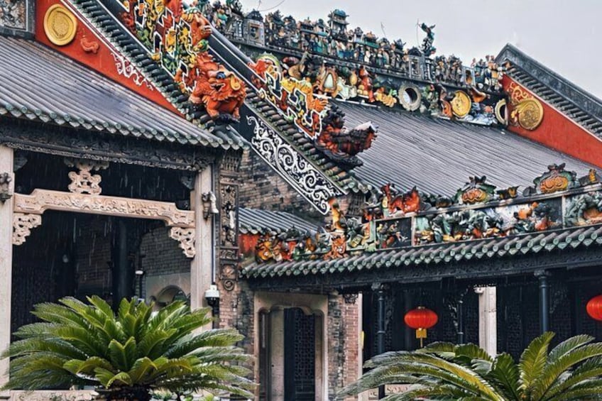 A traditional Chinese building with ornate decorations and a dragon motif. 1