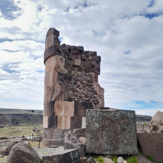 Ancient stone ruins with a clear sky. 1