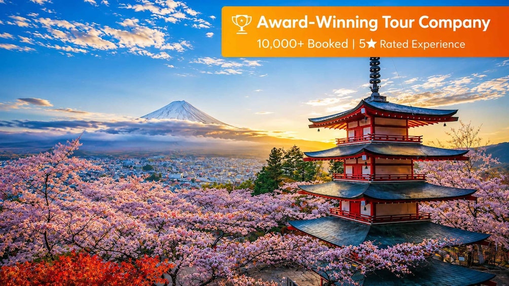 A pagoda surrounded by cherry blossoms with Mount Fuji in the background. 1