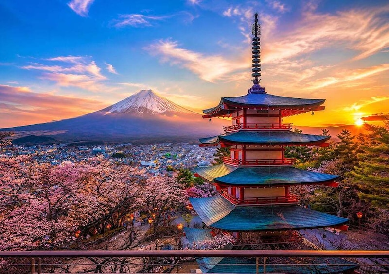 A pagoda with a mountain in the background. 2