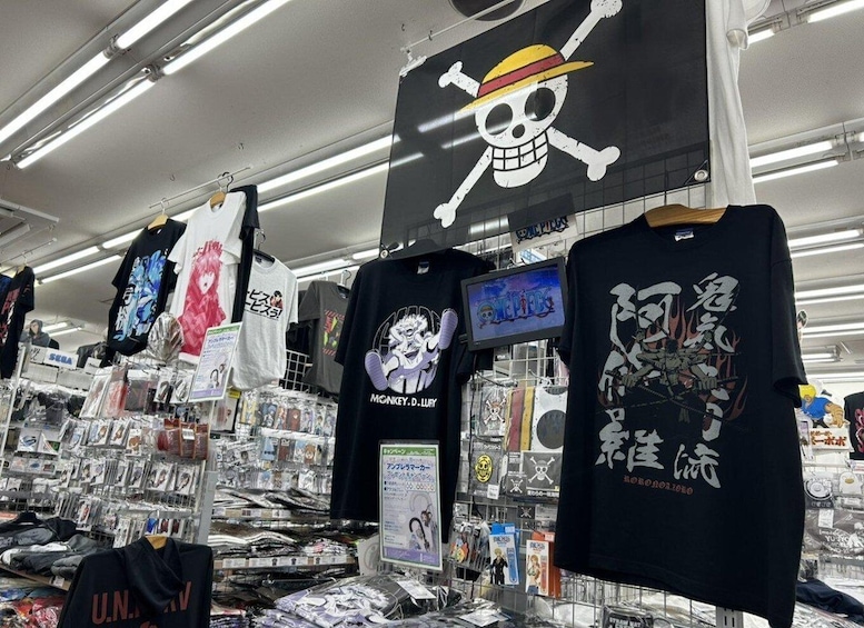 A store with merchandise including t-shirts and anime posters. 4