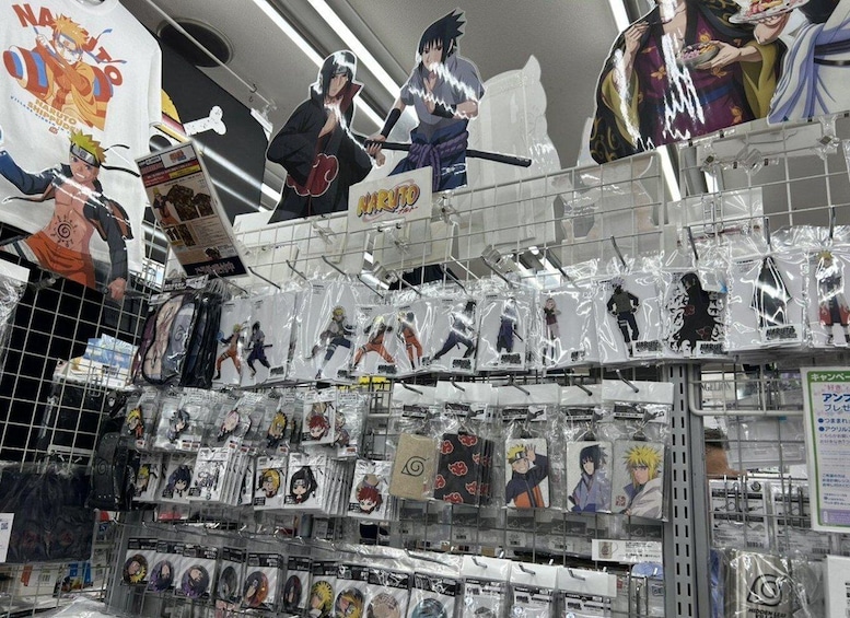 A store shelf stocked with various Naruto merchandise, including action figures and keychains. 2