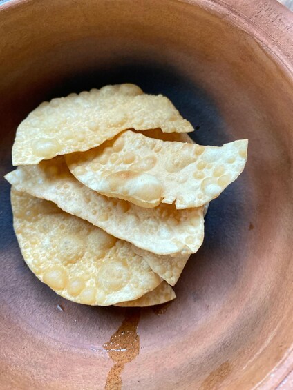 A bowl of flatbread chips. 4