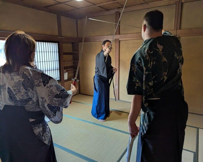 A traditional Japanese room with tatami flooring and shoji screens. 2