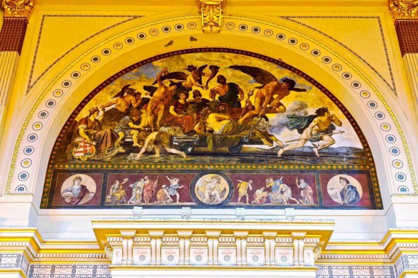 A detailed mural with classical figures and architectural elements. 2