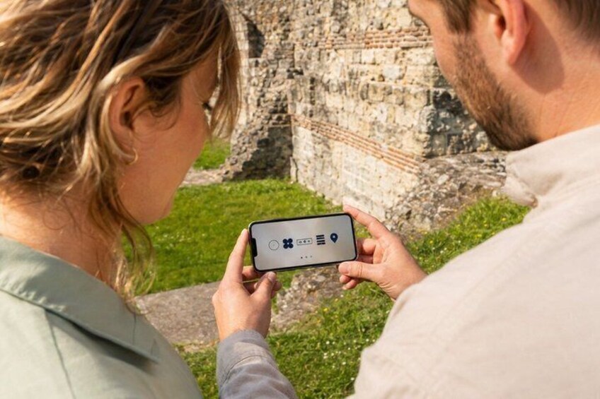 A person using a smartphone with a map application. 5
