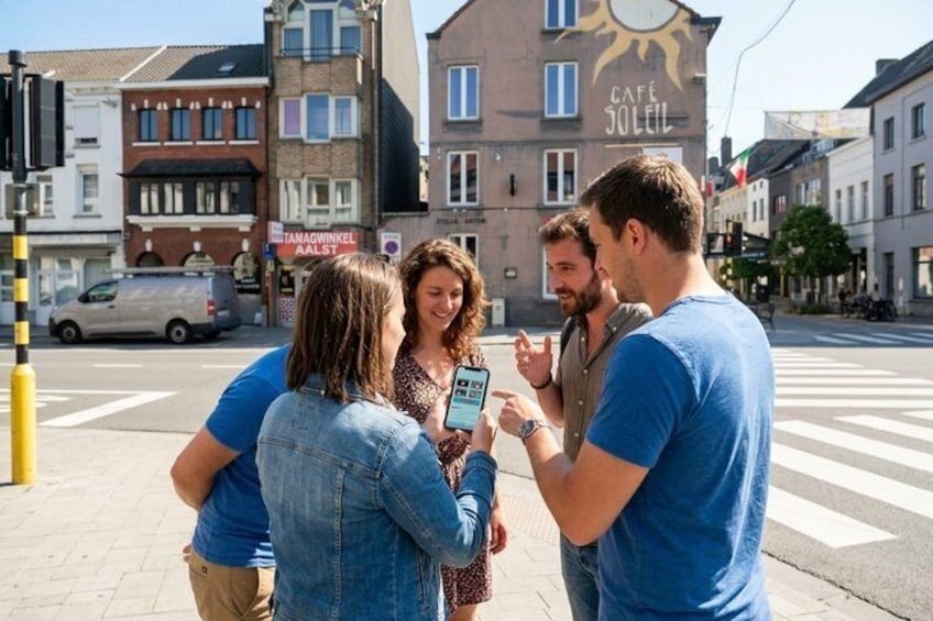 A street scene with a café named 'Café Soleil' and a visible crosswalk. 1