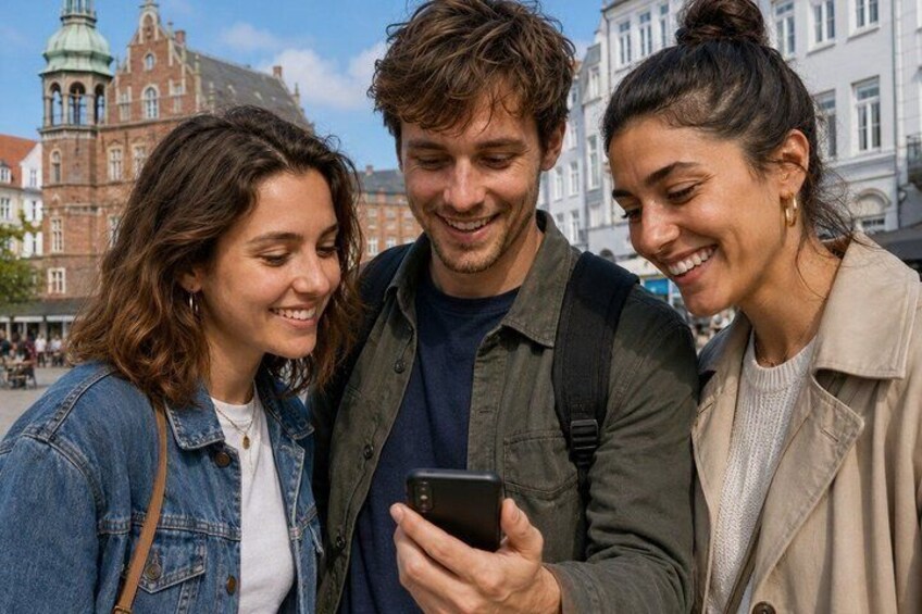 Three people looking at a smartphone, with historic buildings in the background. 3