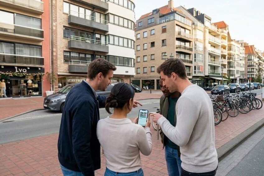 Three people on a city sidewalk, one holding a smartphone. 5