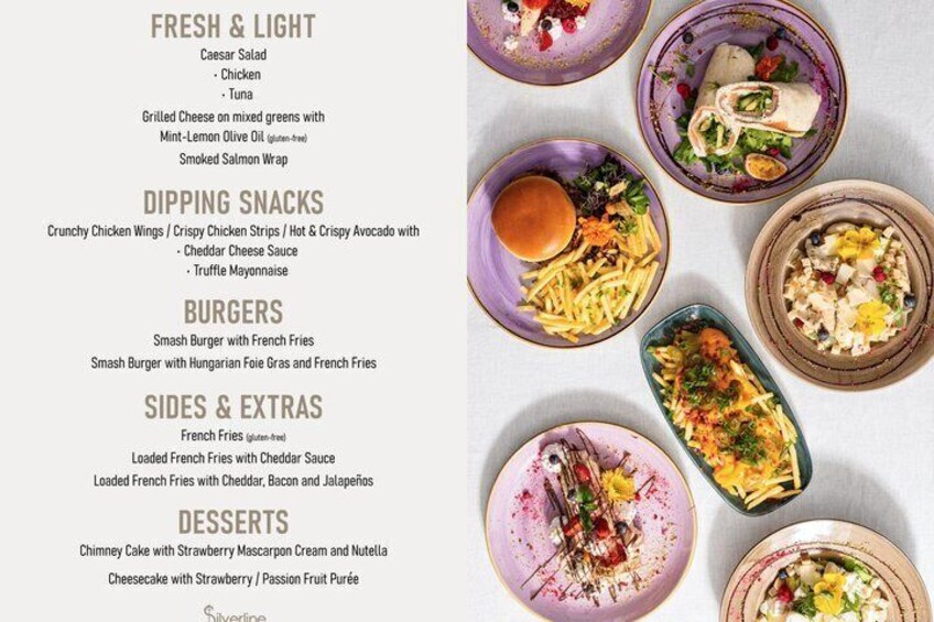 A menu with various food items including Caesar Salad, grilled cheese, and burgers. 2
