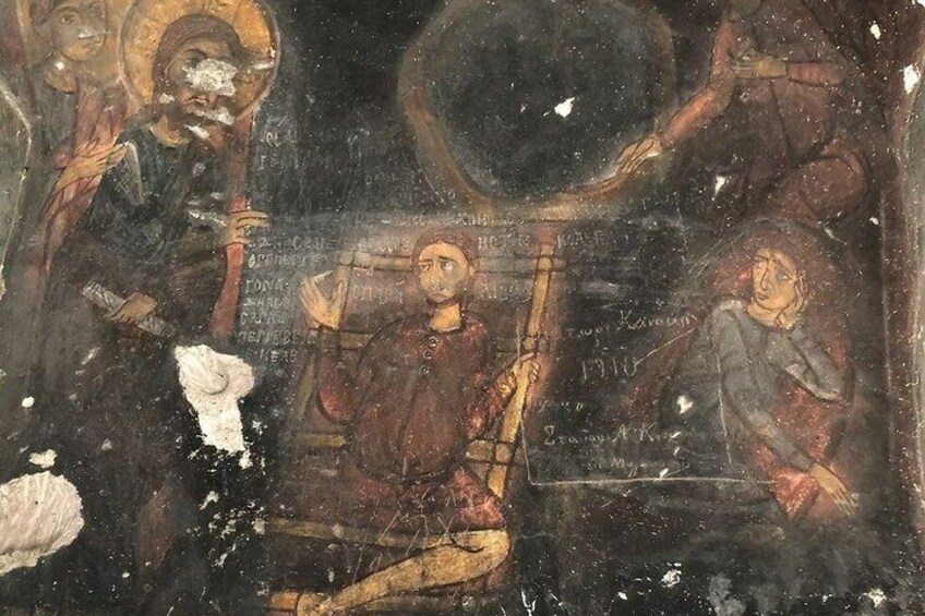 A damaged religious icon with figures and inscriptions. 5