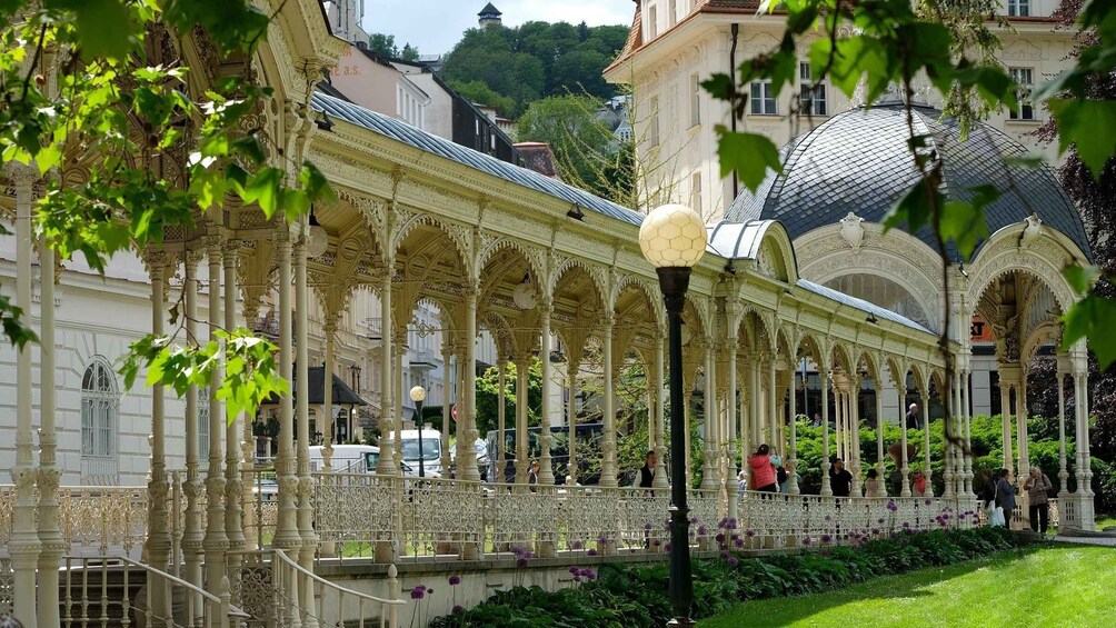 A historic building with ornate arches and a glass dome. 4