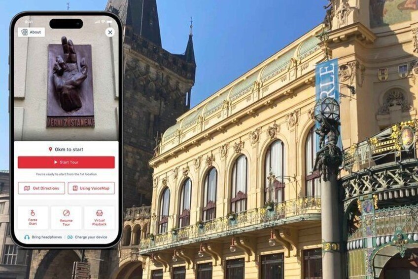 A smartphone displaying a virtual tour interface with a historical building in the background. 1