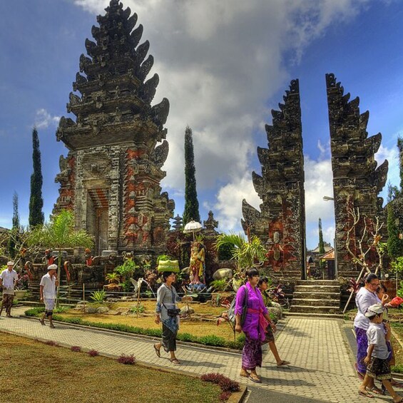 A temple complex with ornate architecture and a pathway. 4