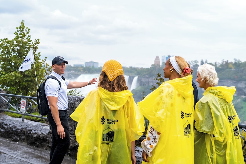 A group of people in yellow rain ponchos at Niagara Falls. 1
