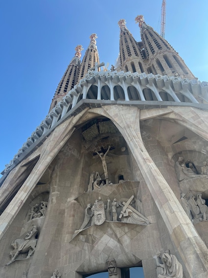 A large stone cathedral with intricate carvings and multiple spires. 3